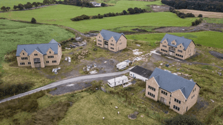 Five houses must be torn down after they were built a third bigger than planned Five houses must be torn down after they were built a third bigger than planned