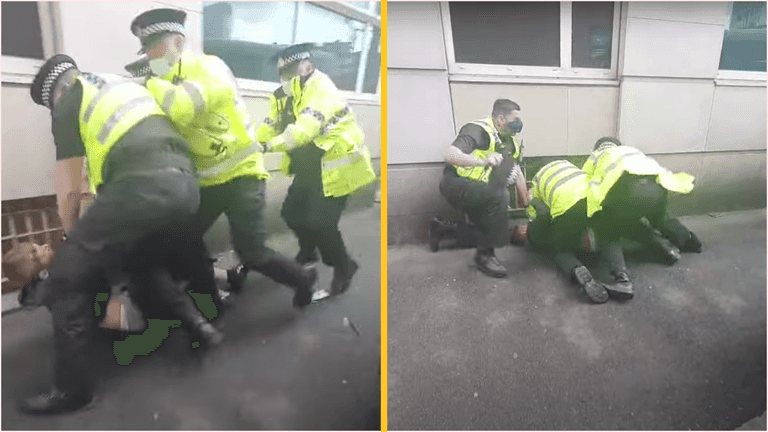 Police to investigate after video emerges of officer appearing to punch Man United fan Police to investigate after video emerges of officer appearing to punch Man United fan