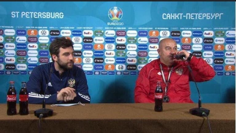 Russian manager goes against Ronaldo and drinks bottle of Coke at press conference Russian manager goes against Ronaldo and drinks bottle of Coke at press conference