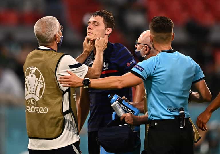 France criticised for allowing Benjamin Pavard to continue after being ‘knocked out’ France criticised for allowing Benjamin Pavard to continue after being ‘knocked out’