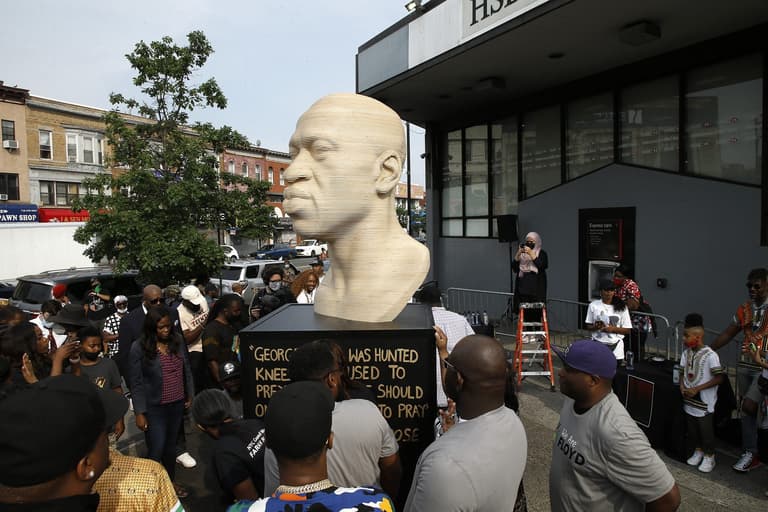 George Floyd statue vandalised less than a week after unveiling in US George Floyd statue vandalised less than a week after unveiling in US