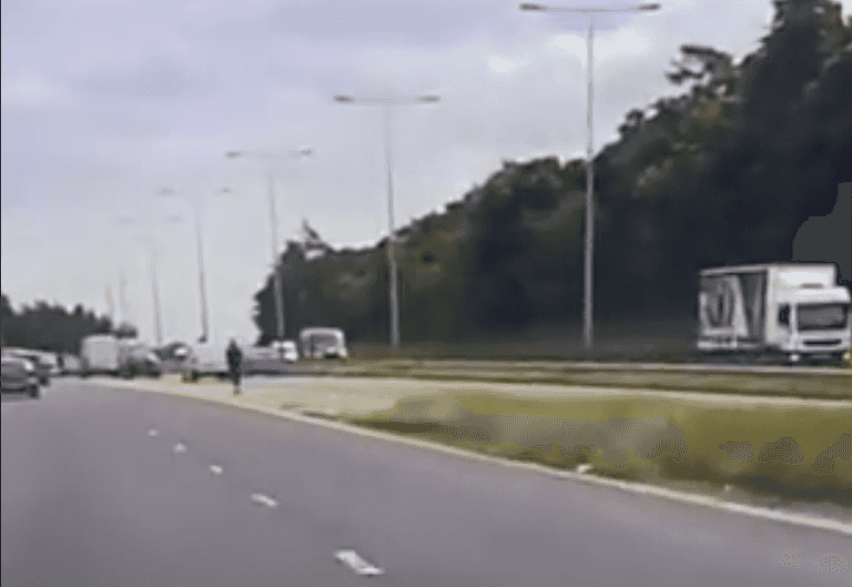 WATCH: Staggering moment police pull over man on e-scooter trying to join motorway WATCH: Staggering moment police pull over man on e-scooter trying to join motorway