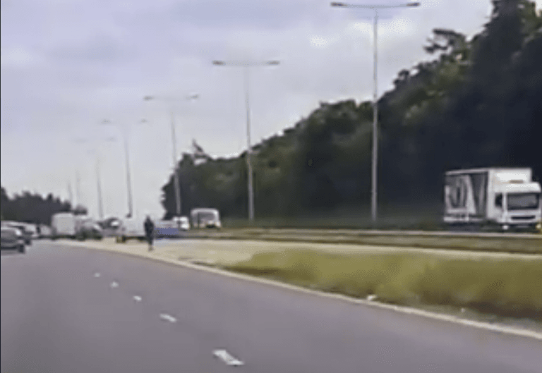 WATCH: Staggering moment police pull over man on e-scooter trying to join motorway WATCH: Staggering moment police pull over man on e-scooter trying to join motorway