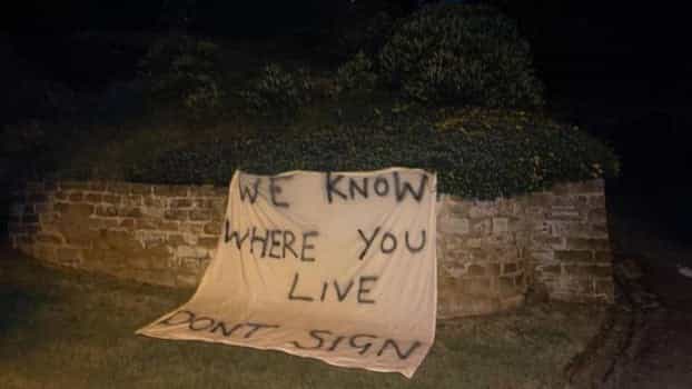 Threatening banner laid near Rafa Benitez’s home as Everton rumours intensify Threatening banner laid near Rafa Benitez’s home as Everton rumours intensify