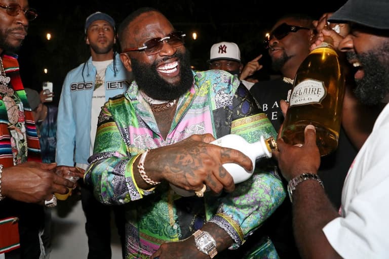 Rick Ross cuts his own lawn to avoid $1 million bill Rick Ross cuts his own lawn to avoid $1 million bill