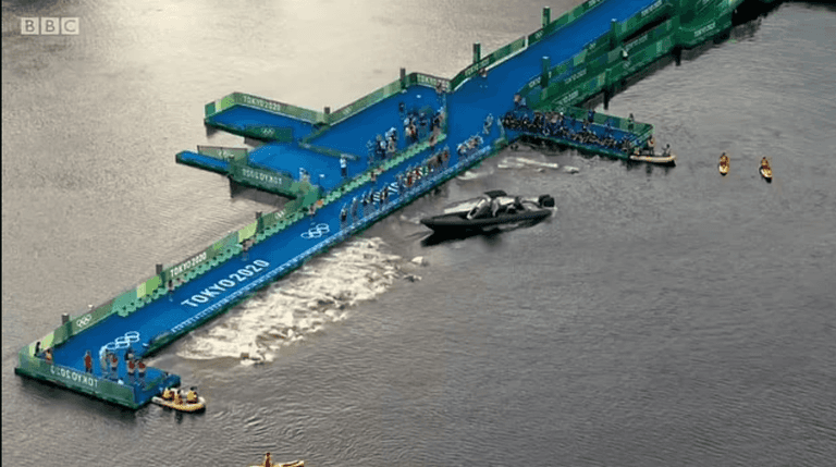 Speed boat causes crazy false start at Olympic triathlon Speed boat causes crazy false start at Olympic triathlon