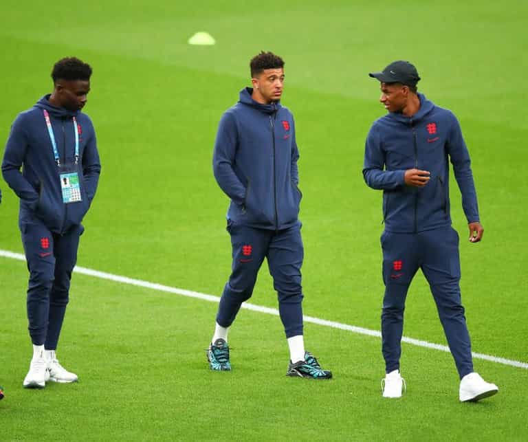 Four arrested over online racist abuse of Rashford, Sancho and Saka Four arrested over online racist abuse of Rashford, Sancho and Saka