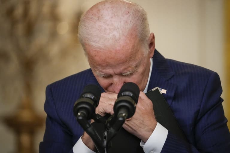 Biden puts head on his hands during tense exchange with Fox reporter Biden puts head on his hands during tense exchange with Fox reporter
