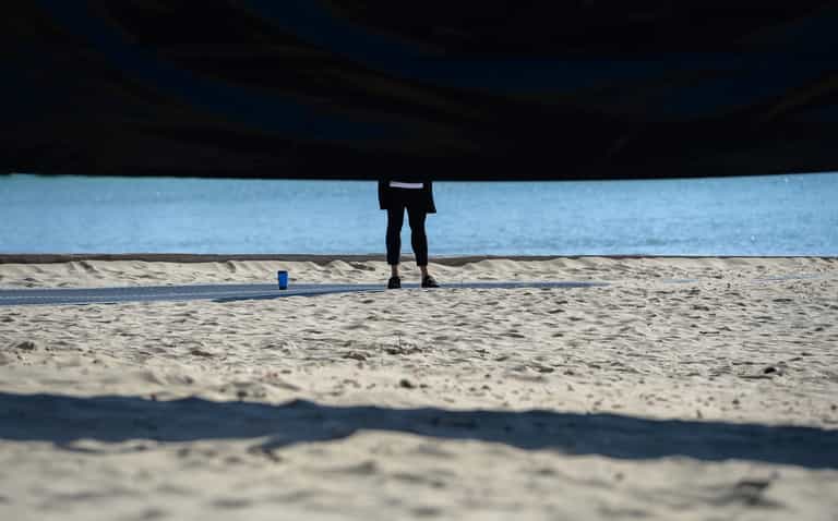 British beach evacuated after ‘large shark’ spotted swimming yards from the shore British beach evacuated after ‘large shark’ spotted swimming yards from the shore