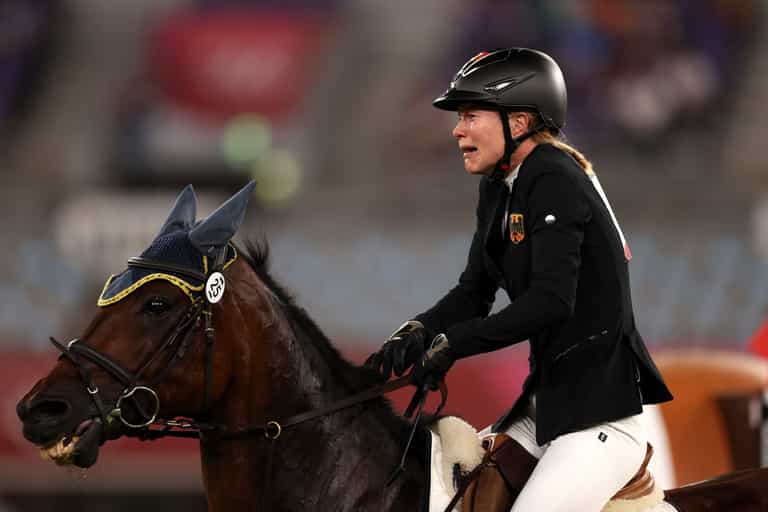 German pentathlon coach thrown out of Tokyo Games for ‘punching a horse’ German pentathlon coach thrown out of Tokyo Games for ‘punching a horse’