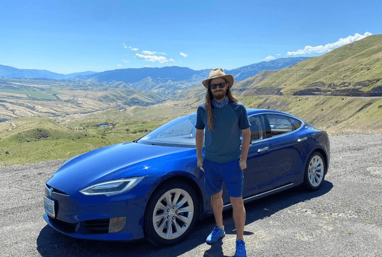 CEO who raised minimum wage to $70k receives Tesla from employees CEO who raised minimum wage to $70k receives Tesla from employees