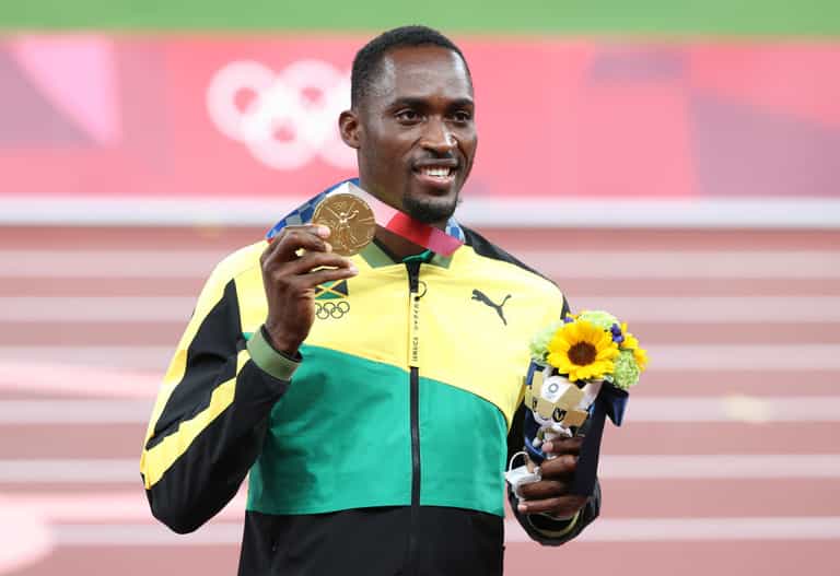 Jamaican gold medalist tracks down volunteer who gave him taxi money to Olympic race Jamaican gold medalist tracks down volunteer who gave him taxi money to Olympic race