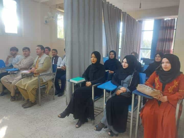 Taliban hides female students behind curtain as Afghan universities return Taliban hides female students behind curtain as Afghan universities return