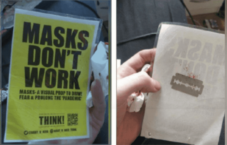 Warning as anti-vaxxers tape razor blades to conspiracy posters Warning as anti-vaxxers tape razor blades to conspiracy posters