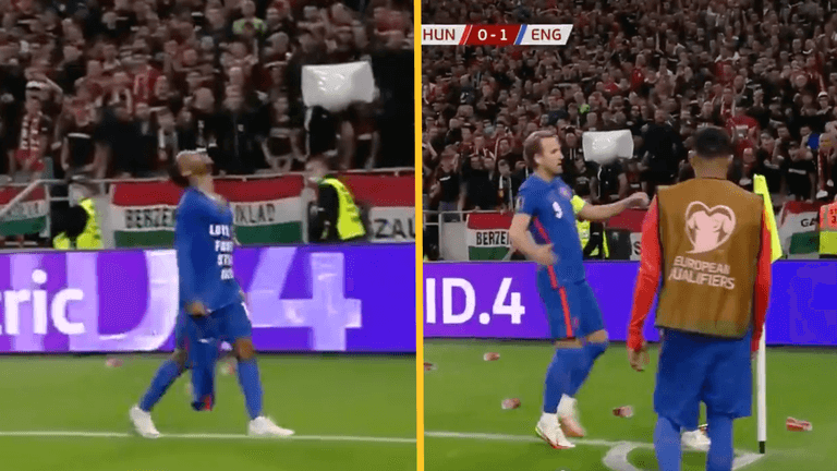 Hungary fans throw cups at Raheem Sterling as he celebrates goal Hungary fans throw cups at Raheem Sterling as he celebrates goal