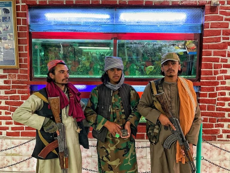 Bodies hang from cranes as Taliban restore public executions Bodies hang from cranes as Taliban restore public executions