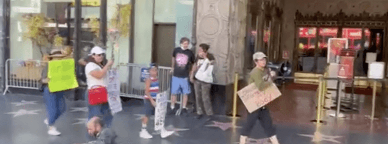 Homeless person perfectly shuts down anti-vaxx protest Homeless person perfectly shuts down anti-vaxx protest