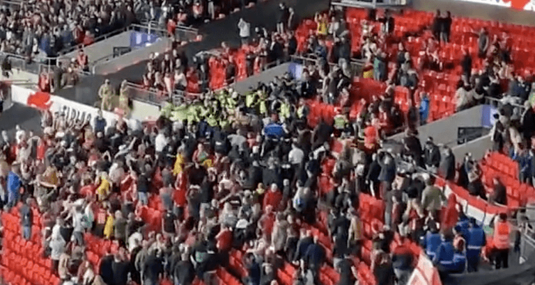 Fighting breaks out as Hungary fans clash with police at Wembley Stadium Fighting breaks out as Hungary fans clash with police at Wembley Stadium