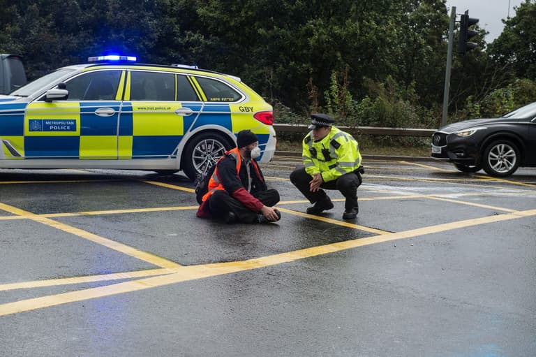BREAKING: Nine Insulate Britain protestors jailed for breaching M25 injunction BREAKING: Nine Insulate Britain protestors jailed for breaching M25 injunction