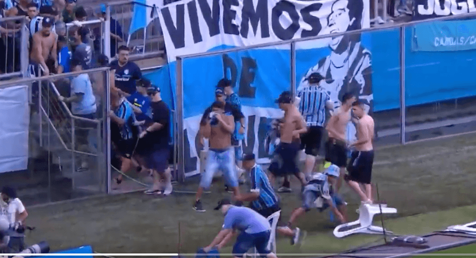 Gremio fans invade pitch and try to break VAR monitor after home defeat