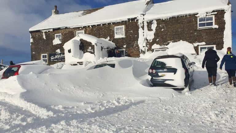 Oasis tribute band and more than 50 punters trapped in Britain’s highest pub Oasis tribute band and more than 50 punters trapped in Britain’s highest pub