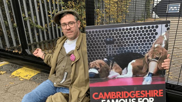 Will Young chains himself to fence of puppy breeding facility to protest animal testing Will Young chains himself to fence of puppy breeding facility to protest animal testing