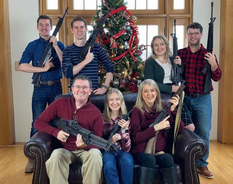 Congressman and family pose with guns for Christmas photo days after school shooting Congressman and family pose with guns for Christmas photo days after school shooting