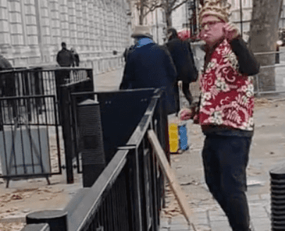 Man turns up for rave outside Downing Street two weeks early Man turns up for rave outside Downing Street two weeks early