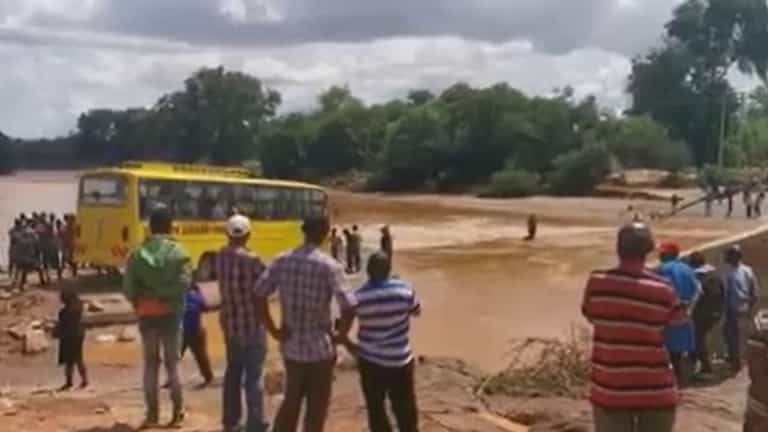 Shocking footage shows moment bus sinks as it crosses flooded road – leaving over 20 dead Shocking footage shows moment bus sinks as it crosses flooded road – leaving over 20 dead