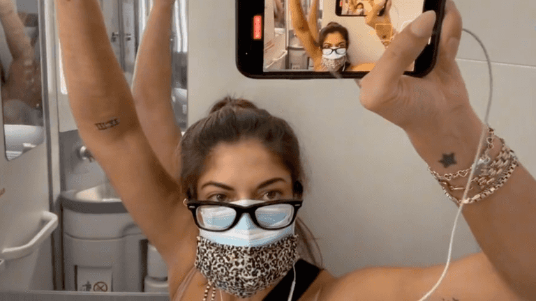 Woman tests positive for covid mid-flight, isolates for five hours in bathroom Woman tests positive for covid mid-flight, isolates for five hours in bathroom