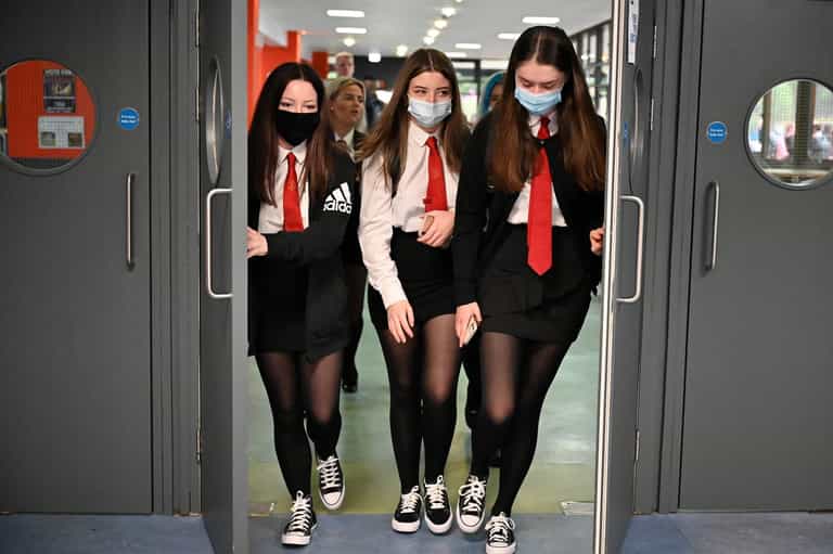 Schools reinstate face mask rules as Covid cases surge Schools reinstate face mask rules as Covid cases surge