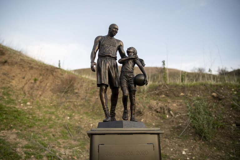 Kobe Bryant and daughter Gianna immortalised in statue at helicopter crash site Kobe Bryant and daughter Gianna immortalised in statue at helicopter crash site