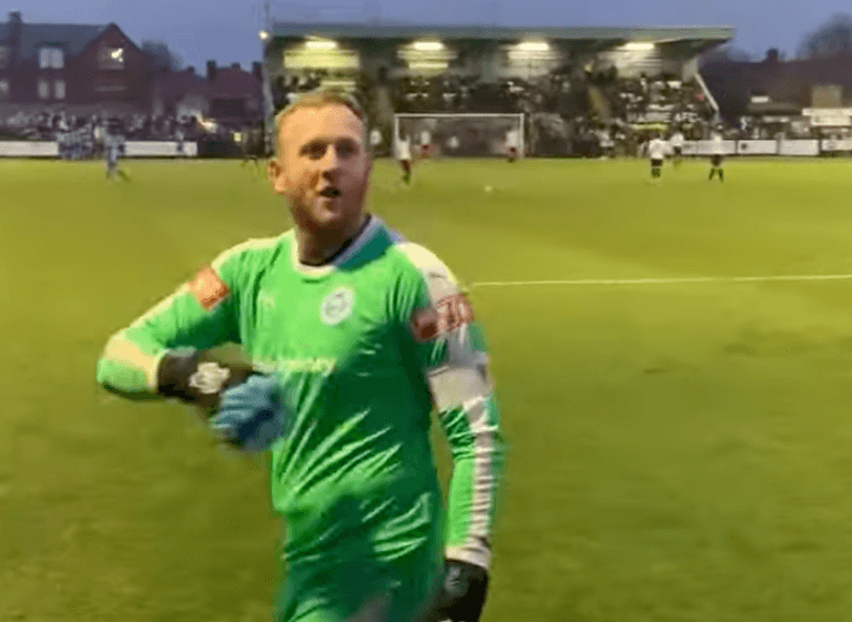 Goalkeeper goes viral for winding up opposition fans with celebration and fake dive Goalkeeper goes viral for winding up opposition fans with celebration and fake dive