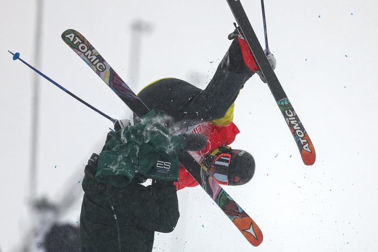 Freestyle skier crashes into camera operator at Winter Olympics Freestyle skier crashes into camera operator at Winter Olympics