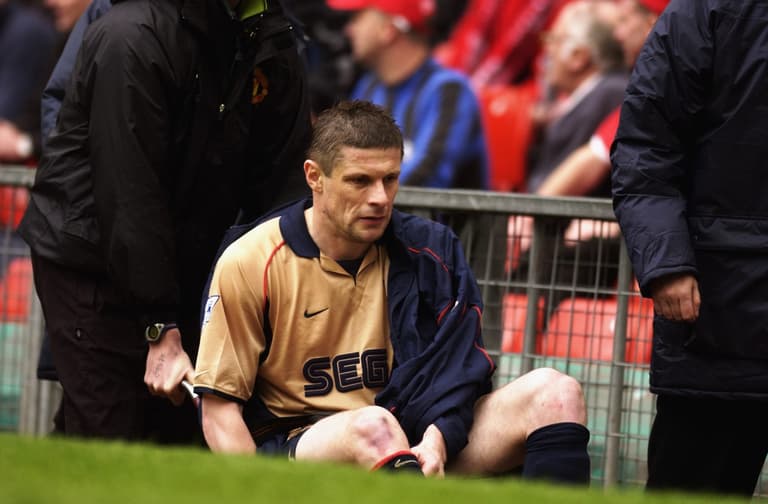 Former Arsenal defender Oleh Luzhnyi pauses coaching career to fight for Ukraine Former Arsenal defender Oleh Luzhnyi pauses coaching career to fight for Ukraine