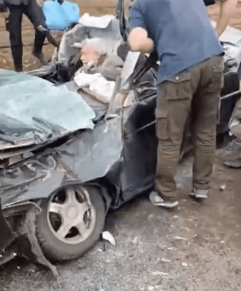 Horrific moment tank crosses road to run over motorist in Ukraine Horrific moment tank crosses road to run over motorist in Ukraine