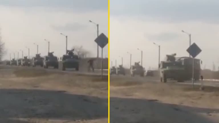 Video shows amazing moment single man tries to stop convoy of Russian tanks Video shows amazing moment single man tries to stop convoy of Russian tanks