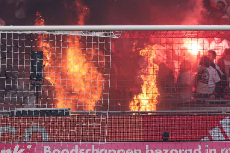 Fire breaks out in stand during Ajax-Feyenoord clash Fire breaks out in stand during Ajax-Feyenoord clash