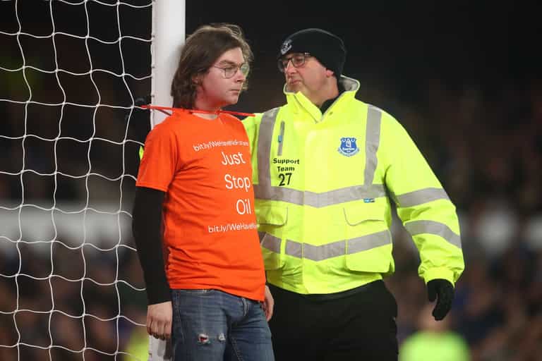 Environmental activist ties himself to post during Everton vs Newcastle clash Environmental activist ties himself to post during Everton vs Newcastle clash