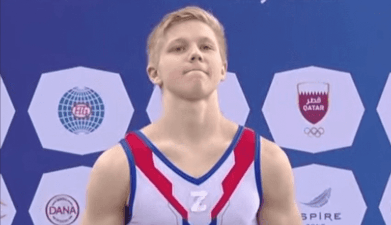 Russian gymnast wears national war symbol while sharing podium with Ukrainian rival Russian gymnast wears national war symbol while sharing podium with Ukrainian rival
