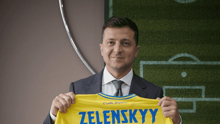 No, Ukrainian President Zelenskyy did not hold up a jersey with a Nazi symbol on No, Ukrainian President Zelenskyy did not hold up a jersey with a Nazi symbol on
