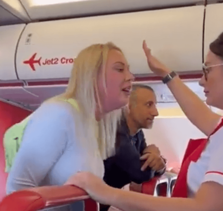 Woman videoed screaming and slapping air-stewardess banned for life Woman videoed screaming and slapping air-stewardess banned for life