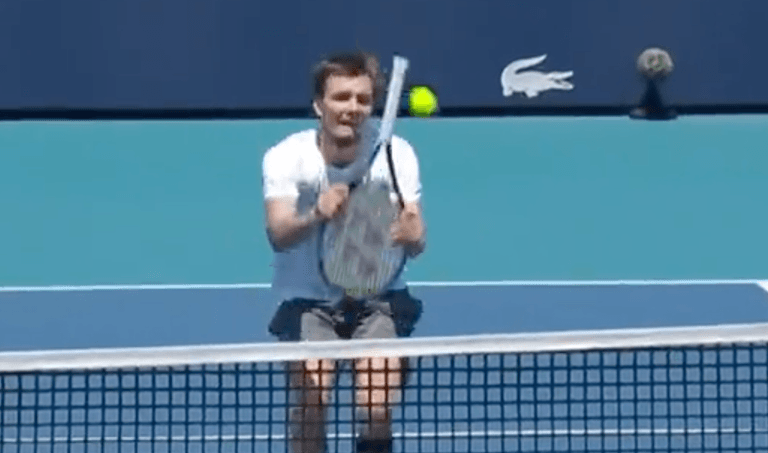 Tennis star pulls off unbelievable trick shot using handle of racket Tennis star pulls off unbelievable trick shot using handle of racket