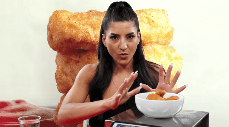 This woman has broken the world record for most nuggets eaten in 60 seconds This woman has broken the world record for most nuggets eaten in 60 seconds