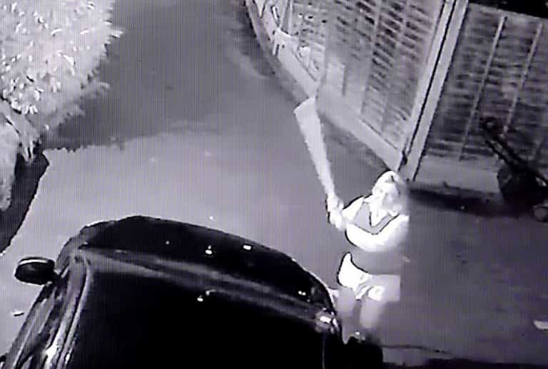 CCTV shows drunk woman smash neighbours’ cars with 3ft pick-axe handle over parking row CCTV shows drunk woman smash neighbours’ cars with 3ft pick-axe handle over parking row