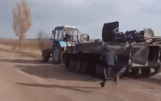 Ukrainian farmer steals Russian tank using his tractor ‘to sell it for scrap’