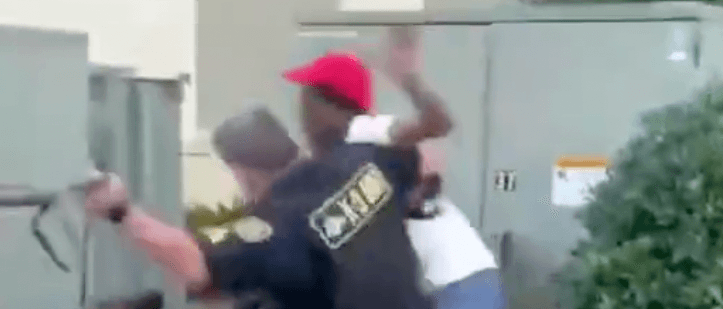 Moment police dog turns on handler after he slams Black man to the ground Moment police dog turns on handler after he slams Black man to the ground