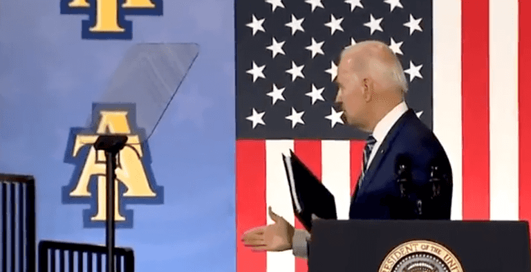 Joe Biden tries to shake hands with thin air after finishing speech Joe Biden tries to shake hands with thin air after finishing speech