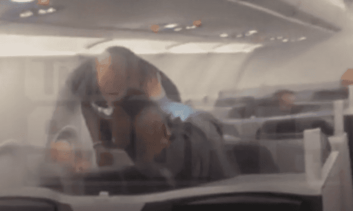 Mike Tyson filmed repeatedly punching passenger on plane Mike Tyson filmed repeatedly punching passenger on plane