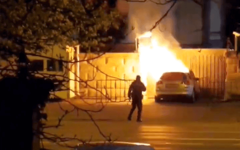 Car rams into gates of Russian Embassy in fiery blaze Car rams into gates of Russian Embassy in fiery blaze